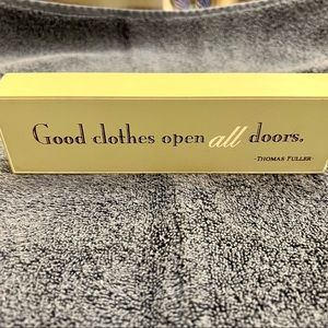Decorative Wooden Sign: Good clothes open all doors. -Thomas Fuller